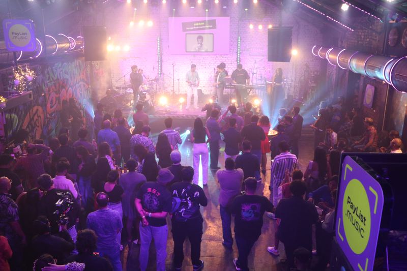 The crowd standing close to the stage